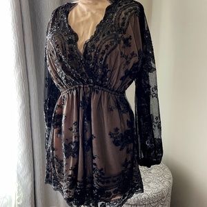 Beautiful Black sequined shorts romper. Approx Size M/L.